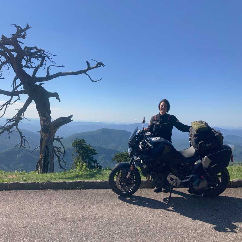 Solo motorcycle traveler on the Blue Ridge Parkway, USA